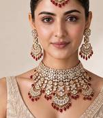 Gold plated ruby red kundan bridal necklace set with maang tikka