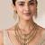 Gold plated emerald green kundan layered necklace set with maang tikka