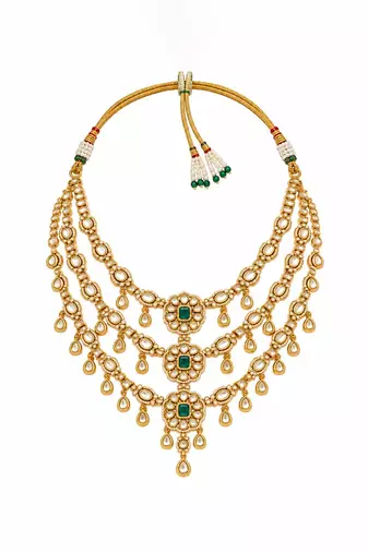Gold plated emerald green kundan layered necklace set with maang tikka