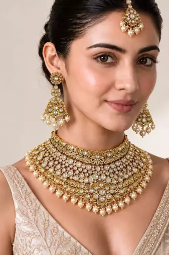 Gold plated pearl kundan necklace set with maang tikka