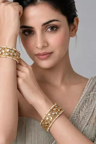 Gold plated kundan pearl leaf statement bangles