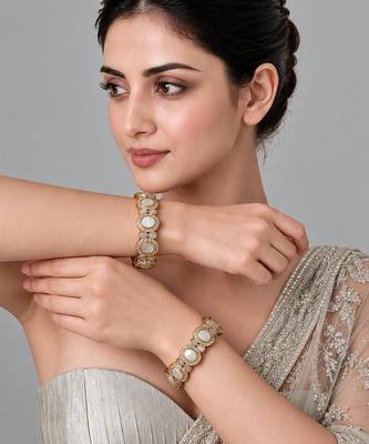 Gold plated pearl kundan halo statement bangles 1