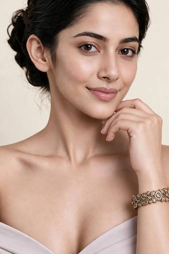 Gold plated clear stone floral kada