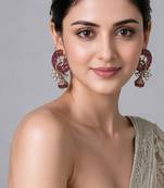Gold plated pink stone peacock motif statement earrings