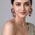 Gold plated pink stone peacock motif statement earrings