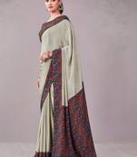 Blue paisley printed crepe saree with blouse piece