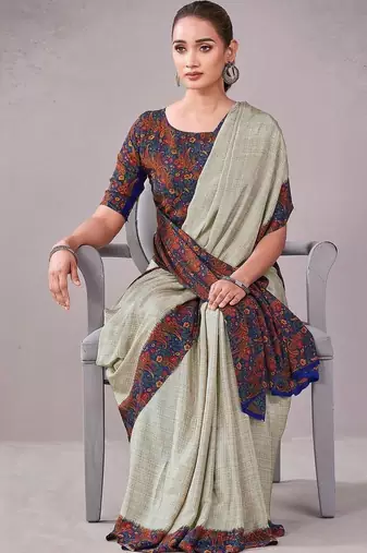 Blue paisley printed crepe saree with blouse piece