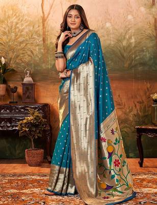 Blue ethnic motifs woven design zari paithani saree 1
