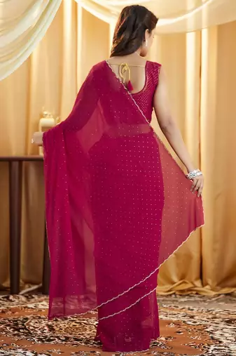 Pink embellished beads and stones  georgette saree