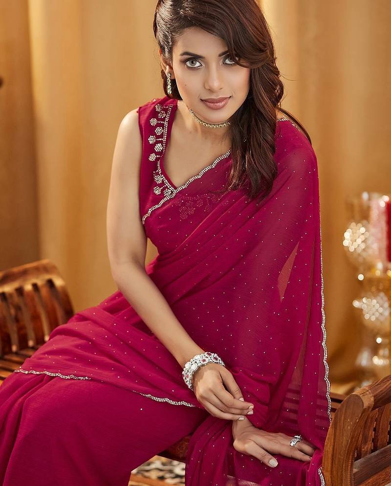 Pink embellished beads and stones  georgette saree