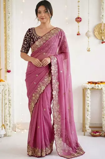 Pink embellished embroidered georgette saree with designer blouse