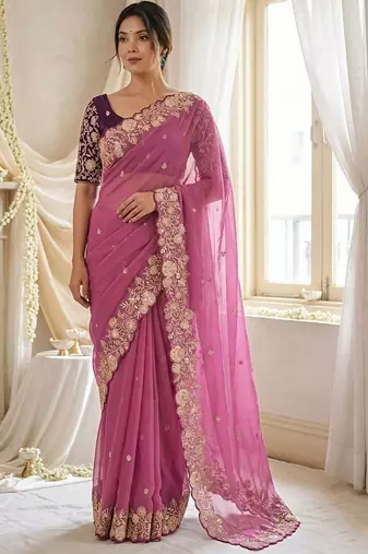 Pink embellished embroidered georgette saree with designer blouse