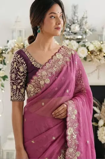 Pink embellished embroidered georgette saree with designer blouse