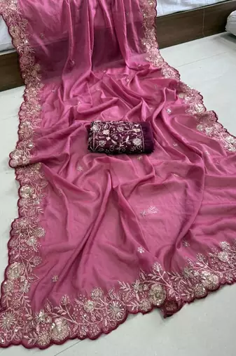 Pink embellished embroidered georgette saree with designer blouse