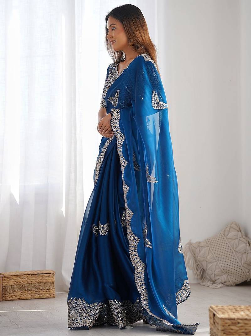 Blue embellished sequinned organza heavy work saree