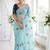 Blue woven design mirror work georgette saree
