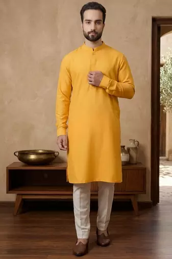 Elegant mustard yellow cotton men's kurta with cream pants