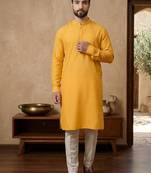Elegant mustard yellow cotton men's kurta with cream pants