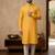 Elegant mustard yellow cotton men's kurta with cream pants