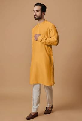 Elegant mustard yellow cotton men's kurta with cream pants 2