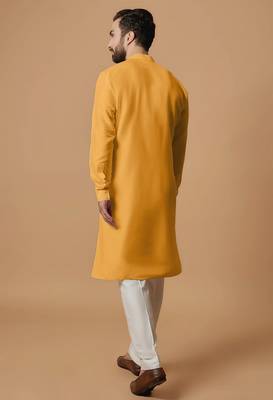 Elegant mustard yellow cotton men's kurta with cream pants 3