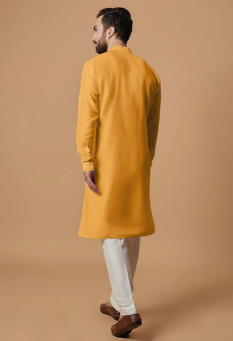 Elegant mustard yellow cotton men's kurta with cream pants