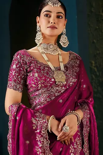 Pink embellished embroidered tissue saree with designer blouse