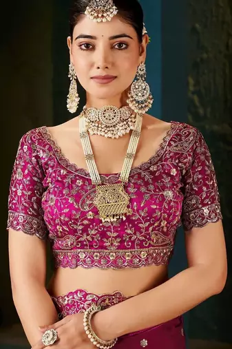 Pink embellished embroidered tissue saree with designer blouse