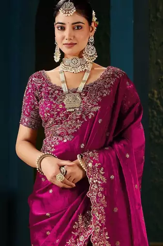 Pink embellished embroidered tissue saree with designer blouse