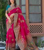 Pink woven design embroidered art silk saree