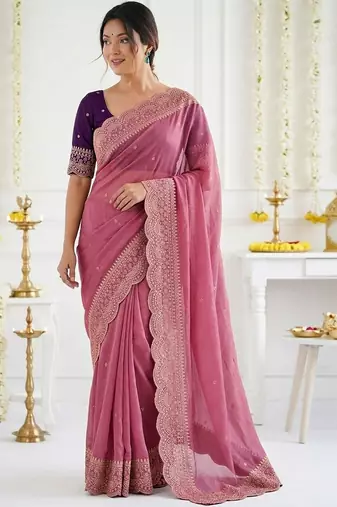 Pink ethnic motifs embroidered georgette saree with designer blouse