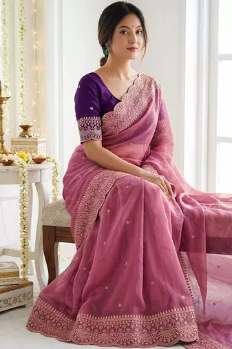 Pink ethnic motifs embroidered georgette saree with designer blouse