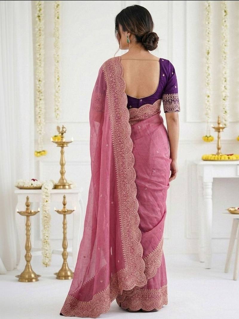 Pink ethnic motifs embroidered georgette saree with designer blouse