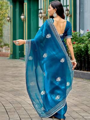 Blue ethnic motifs embroidered saree 4