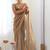 Gold tissue sequence embroidered saree with blouse piece