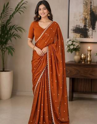 Rust woven design embroidered art silk saree 1