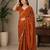 Rust woven design embroidered art silk saree