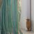 Turquoise tissue sequence embroidered saree with blouse piece