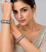 Gold plated emerald green moissanite polki statement bangles