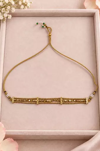 Antique gold-tone bar choker with geometric detailing