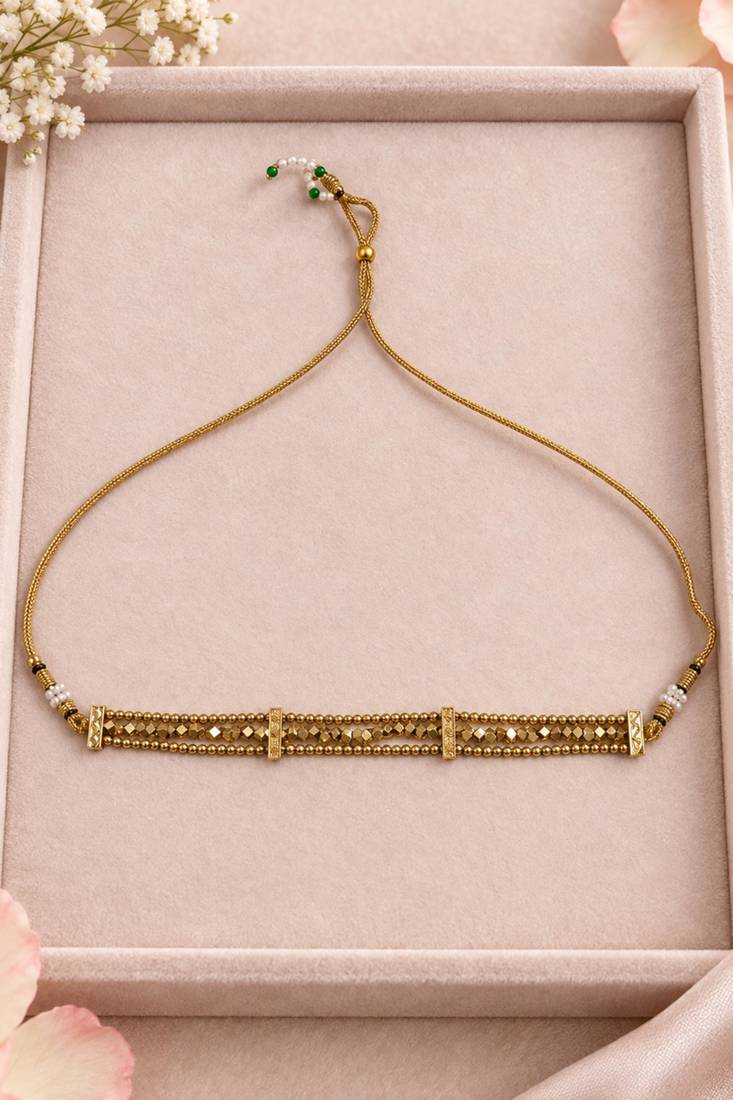 Antique gold-tone bar choker with geometric detailing