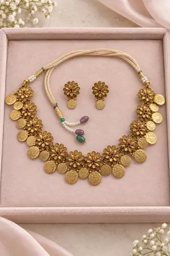 Antique gold-tone floral coin necklace set with matching earrings