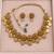 Antique gold-tone floral coin necklace set with matching earrings