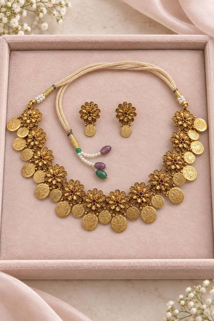 Antique gold-tone floral coin necklace set with matching earrings