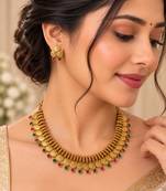 Antique gold-tone coin necklace set with pink and green accents