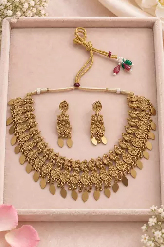 Antique gold-tone temple necklace set with paisley charms and earrings