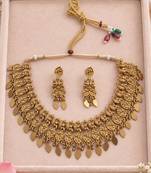 Antique gold-tone temple necklace set with paisley charms and earrings