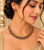 Gold-tone necklace set with alternating pink and green teardrop stones