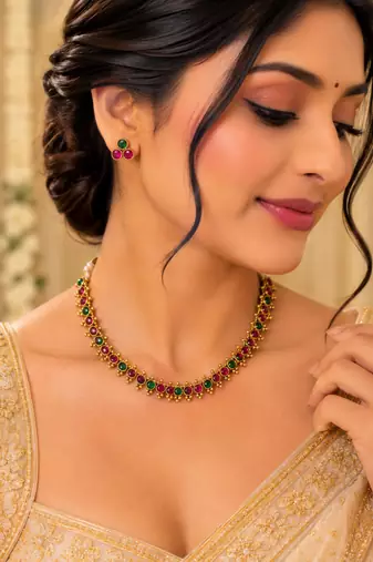 Gold-tone ruby and emerald round stone necklace set with earrings