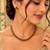 Gold-tone ruby and emerald round stone necklace set with earrings